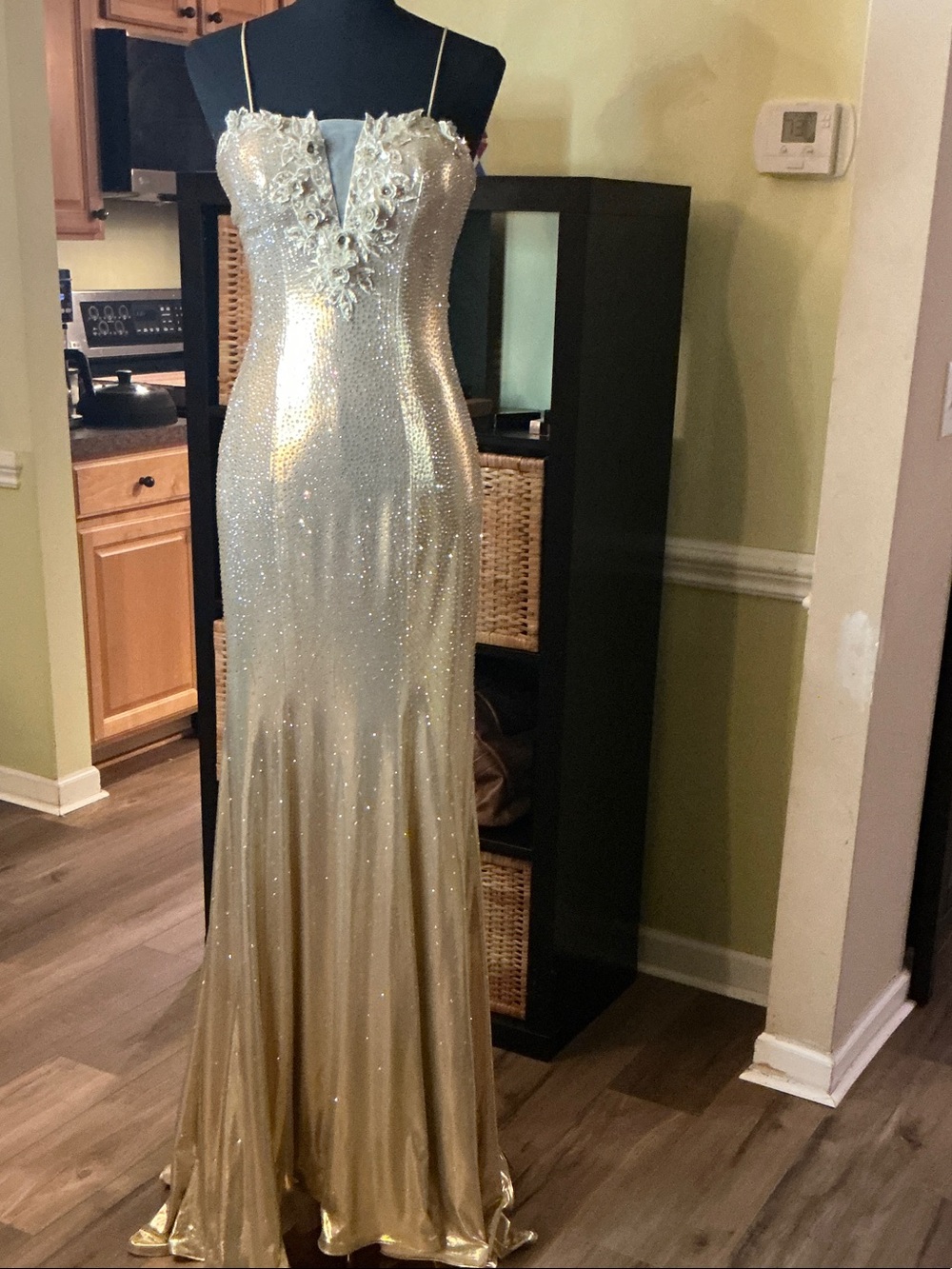 JOVANI Gold Sequin Mermaid Gown with Floral Appliqué